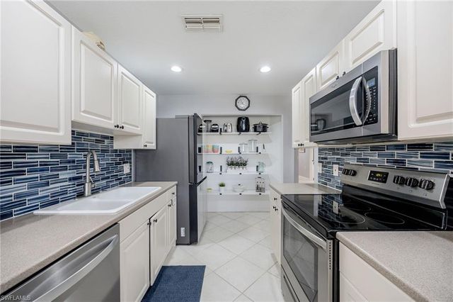 7098 Pond Cypress CT 102, Naples, FL 34109