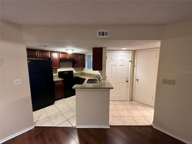 1940 LAKE ATRIUMS CIRCLE 89, Orlando, FL 32839