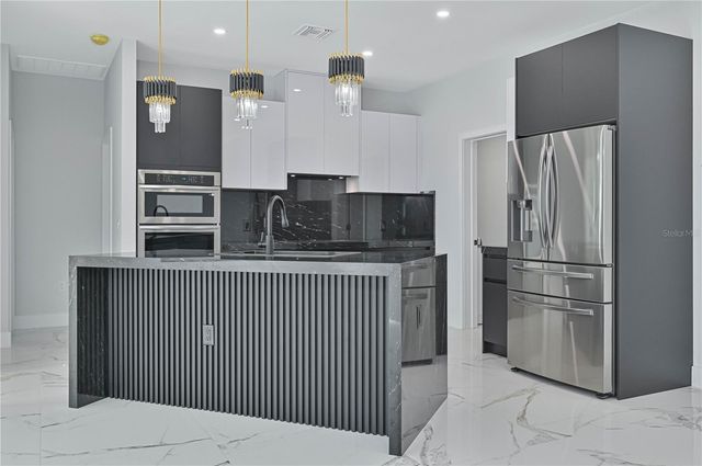 1413 NE 7TH AVENUE, Cape Coral, FL 33909