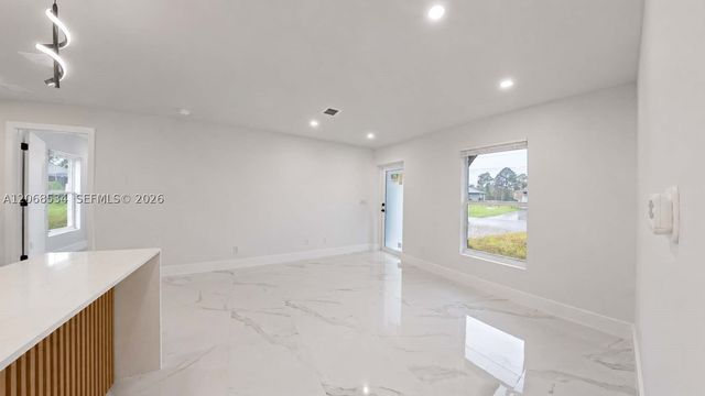 729 Anaconda Ave S, Lehigh Acres, FL 33974