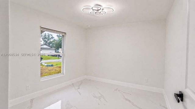 729 Anaconda Ave S, Lehigh Acres, FL 33974