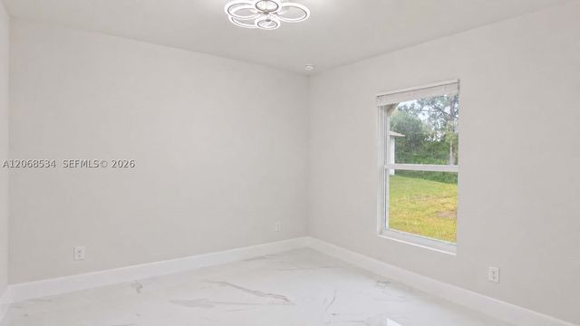 729 Anaconda Ave S, Lehigh Acres, FL 33974