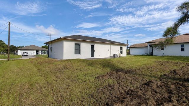 729 Anaconda Ave S, Lehigh Acres, FL 33974