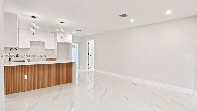 729 Anaconda Ave S, Lehigh Acres, FL 33974