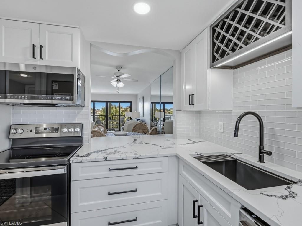 848 Elkcam CIR 302, MARCO ISLAND, FL 34145 — photo 4