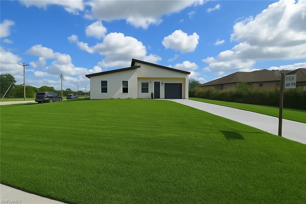761 Bell BLVD S, LEHIGH ACRES, FL 33974 — exterior