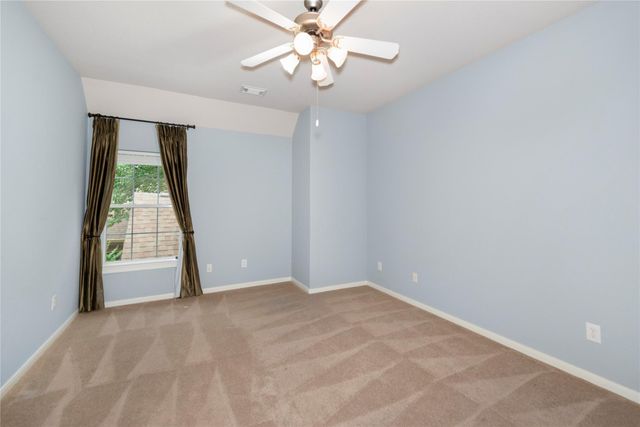 15 Pawprint Place, The Woodlands, TX 77382
