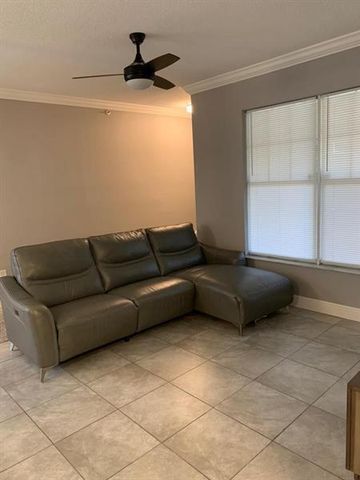 6020 W SAMPLE Road 105, Coral Springs, FL 33067