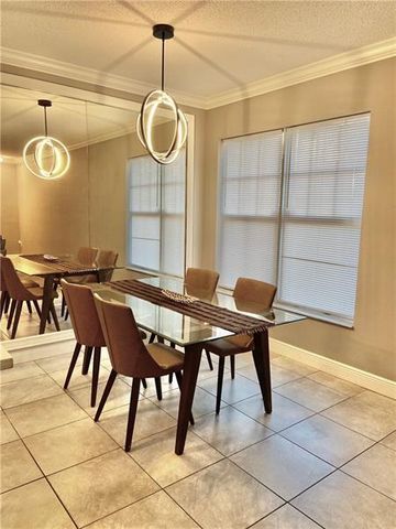 6020 W SAMPLE Road 105, Coral Springs, FL 33067