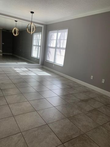 6020 W SAMPLE Road 105, Coral Springs, FL 33067