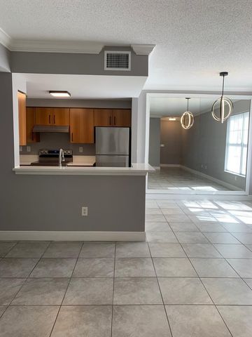 6020 W SAMPLE Road 105, Coral Springs, FL 33067