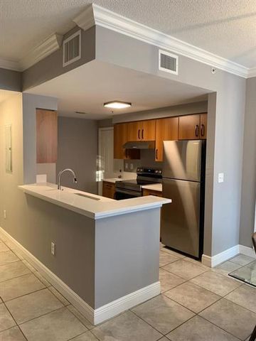 6020 W SAMPLE Road 105, Coral Springs, FL 33067