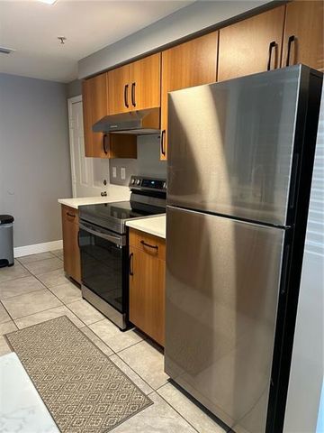 6020 W SAMPLE Road 105, Coral Springs, FL 33067
