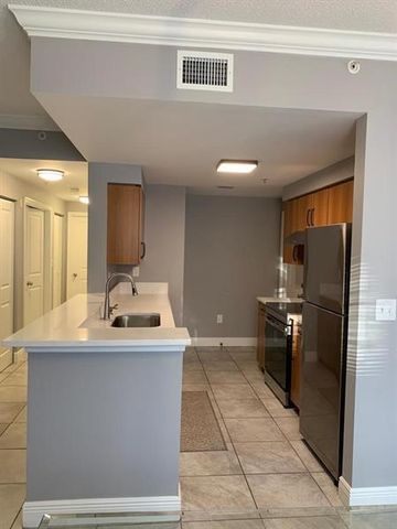 6020 W SAMPLE Road 105, Coral Springs, FL 33067