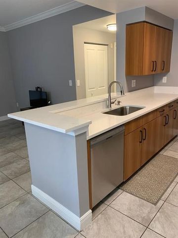 6020 W SAMPLE Road 105, Coral Springs, FL 33067