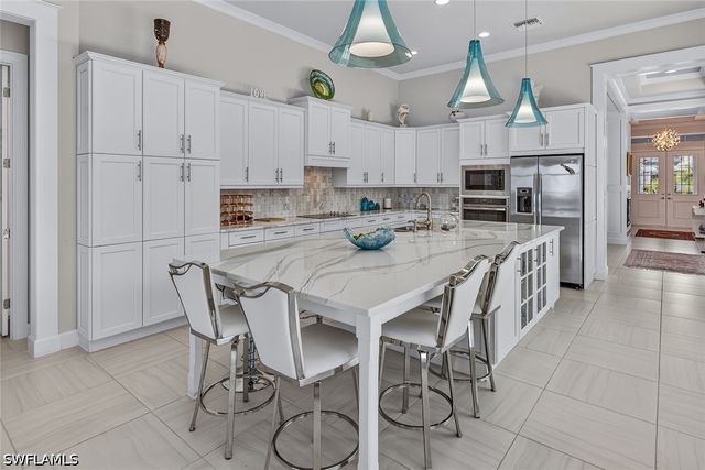 6387 Warwick AVE, Naples, FL 34113