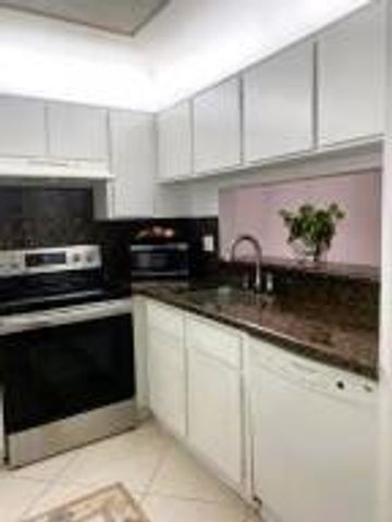 8820 Royal Palm Boulevard 104, Coral Springs, FL 33065