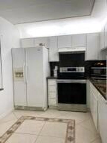 8820 Royal Palm Boulevard 104, Coral Springs, FL 33065