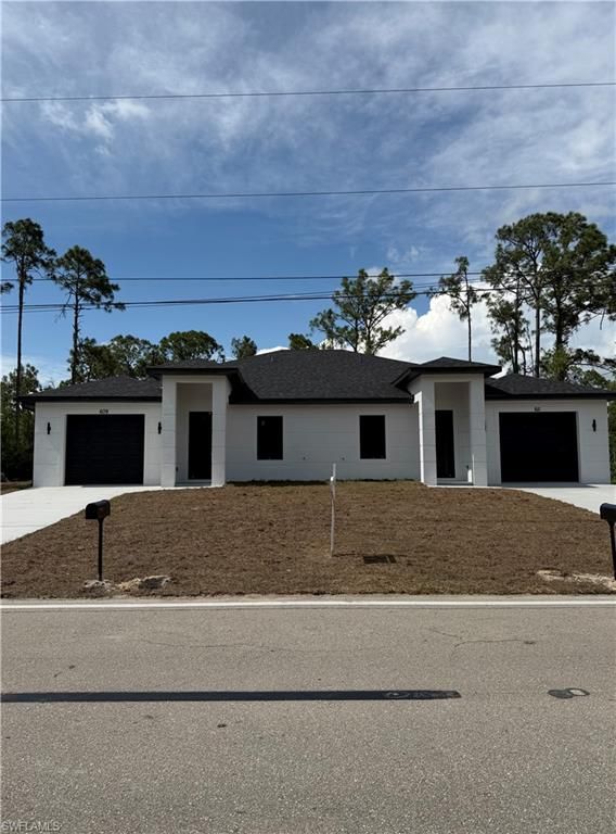 609 E 12th ST, LEHIGH ACRES, FL 33972 — exterior