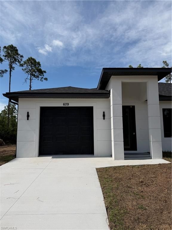609 E 12th ST, LEHIGH ACRES, FL 33972 — photo 2