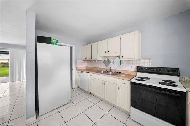406 15th AVE, Cape Coral, FL 33909