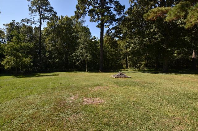 302 Waterfall Drive, Huffman, TX 77336