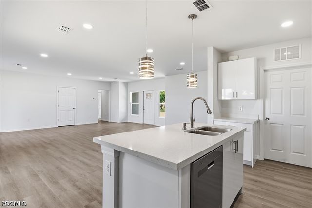 1406 Ford CIR, Lehigh Acres, FL 33936