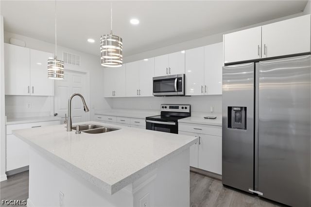 1406 Ford CIR, Lehigh Acres, FL 33936