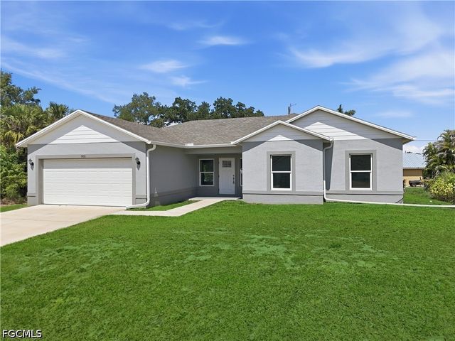 1406 Ford CIR, Lehigh Acres, FL 33936