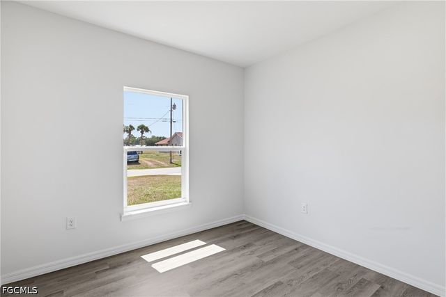 1406 Ford CIR, Lehigh Acres, FL 33936