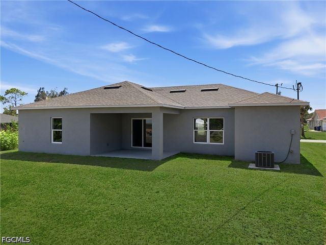 1406 Ford CIR, Lehigh Acres, FL 33936