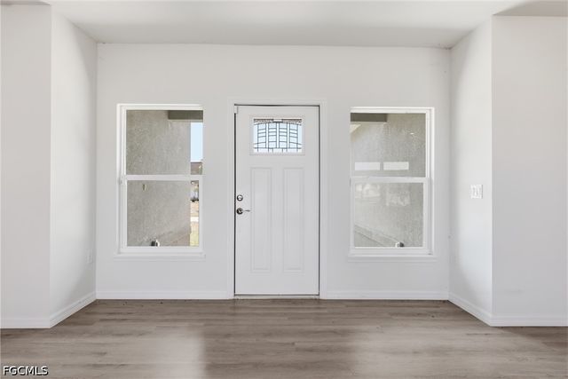 1406 Ford CIR, Lehigh Acres, FL 33936