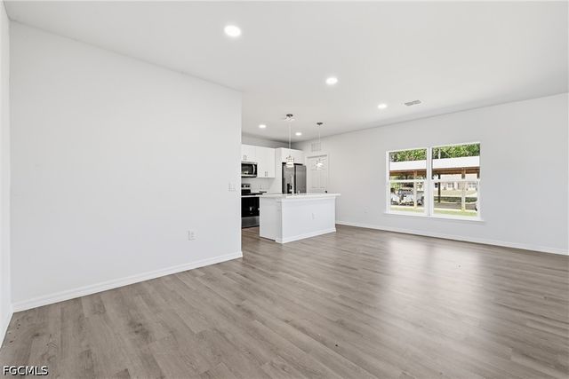 1406 Ford CIR, Lehigh Acres, FL 33936