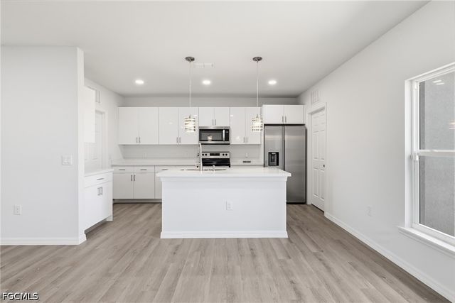 1406 Ford CIR, Lehigh Acres, FL 33936