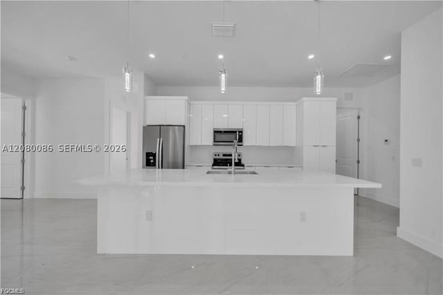 4703 Sara AVE N, Lehigh Acres, FL 33971