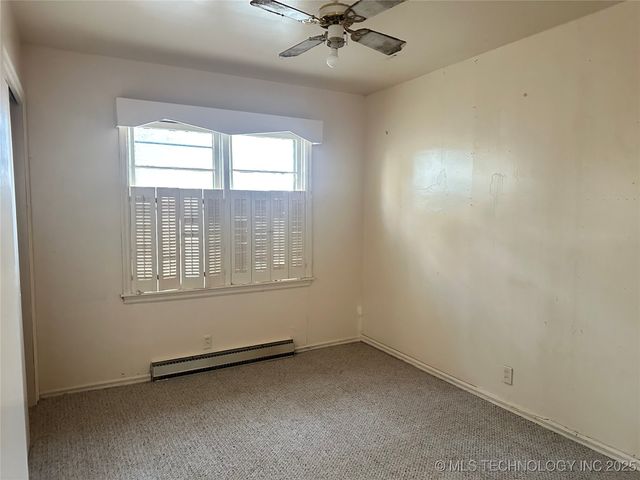 1725 E Elm Lane, Okmulgee, OK 74447