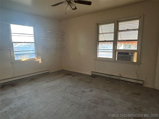 1725 E Elm Lane, Okmulgee, OK 74447