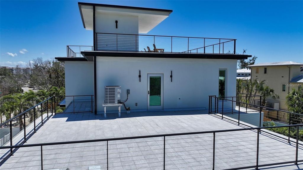Image 60 of property listing at 8800 MIDNIGHT PASS ROAD, Sarasota, FL 34242