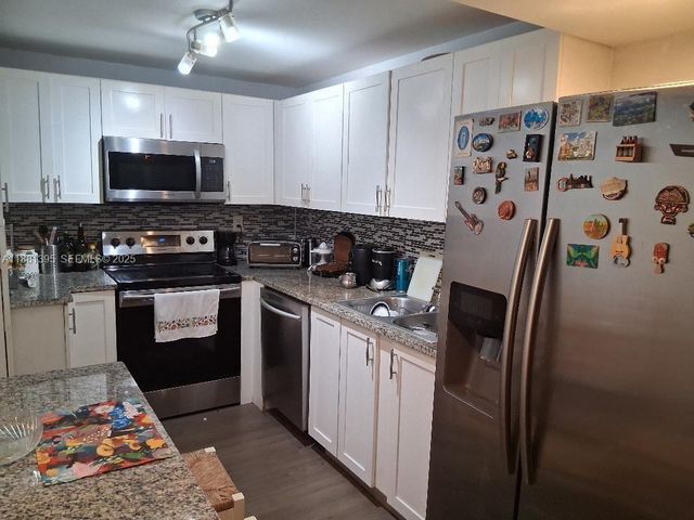 1400 St Charles Place 201, Pembroke Pines, FL 33026