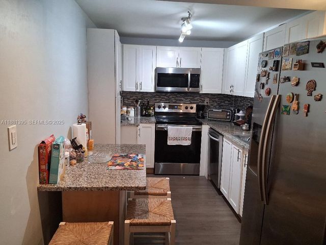 1400 St Charles Place 201, Pembroke Pines, FL 33026