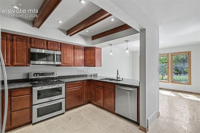 23 Woodbridge Drive, Colorado Springs, CO 80906