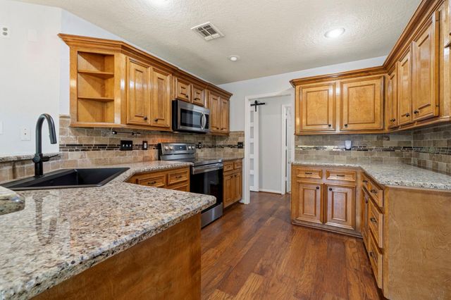 7314 Charred Pine Drive, Magnolia, TX 77354