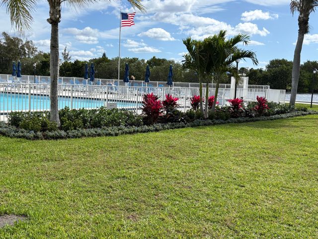 11 Colonial Club Drive 105, Boynton Beach, FL 33435