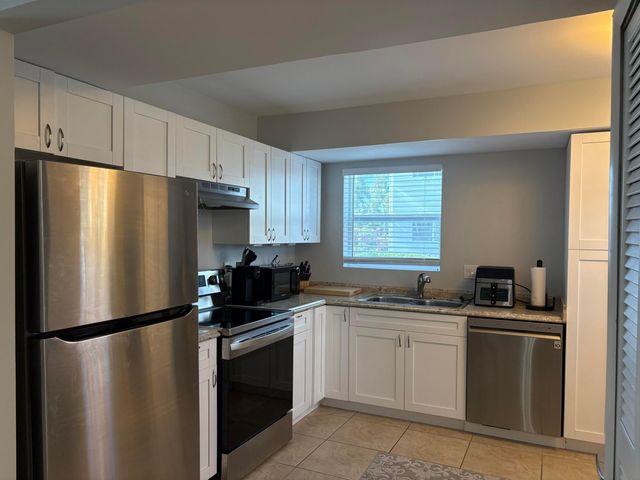 11 Colonial Club Drive 105, Boynton Beach, FL 33435