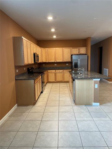 1055 SUGARWOOD STREET, Davenport, FL 33837