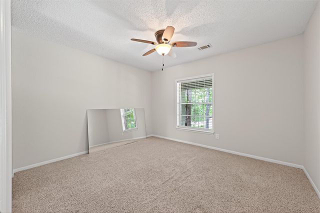 106 Breezy Point Pl, Spring, TX 77381