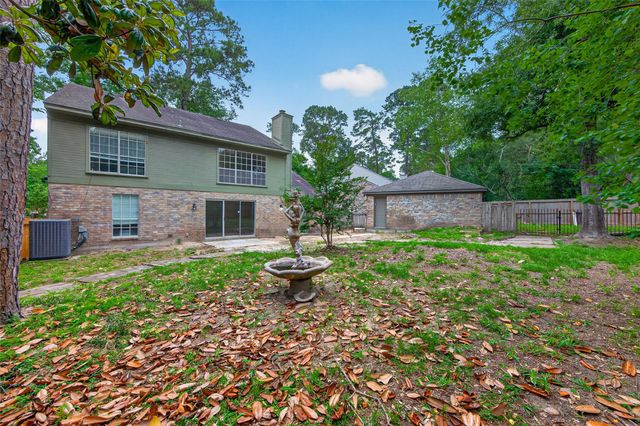 106 Breezy Point Pl, Spring, TX 77381