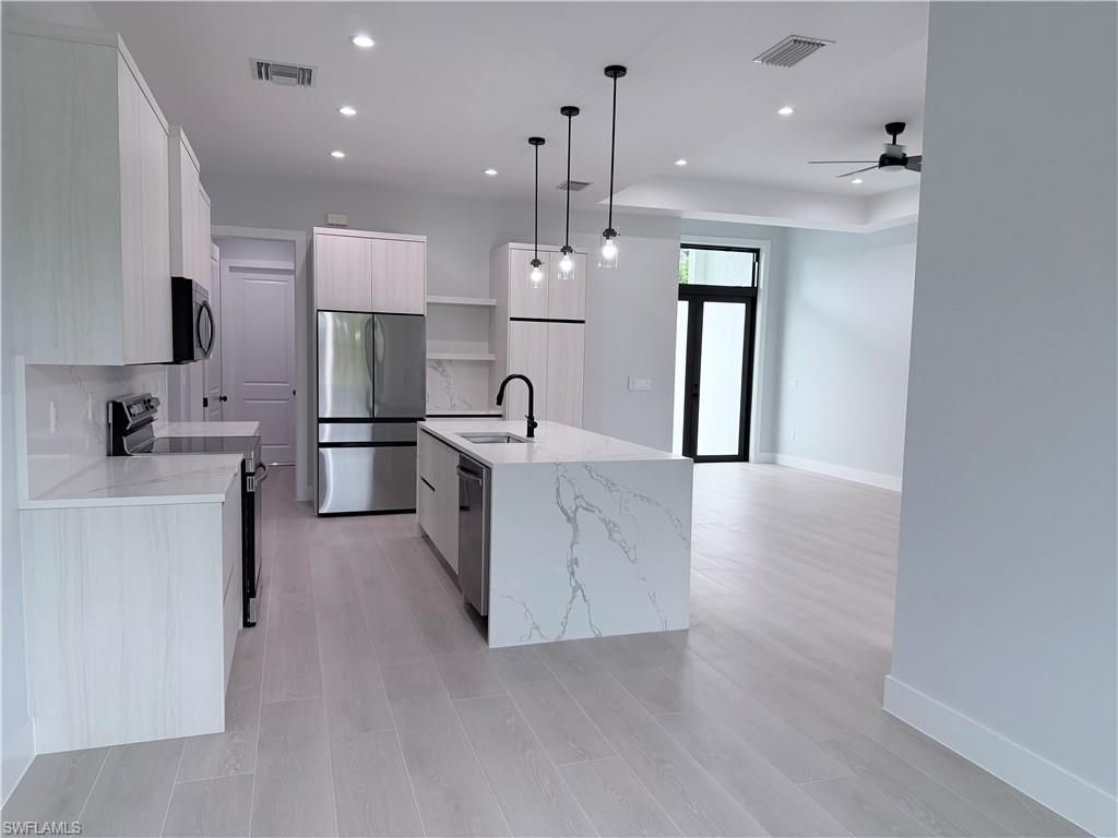 472 12TH ST NE, NAPLES, FL 34120 — photo 4