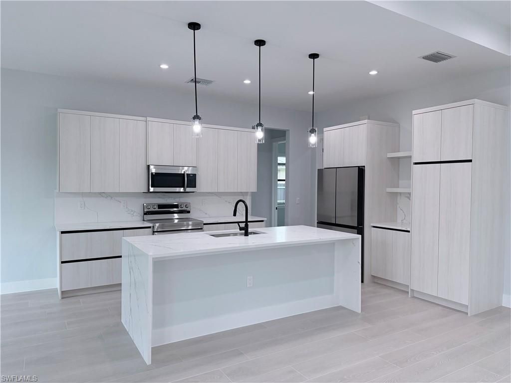 472 12TH ST NE, NAPLES, FL 34120 — photo 5