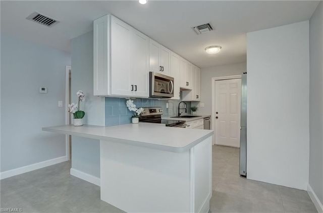 4516 W Alhambra CIR, Naples, FL 34103